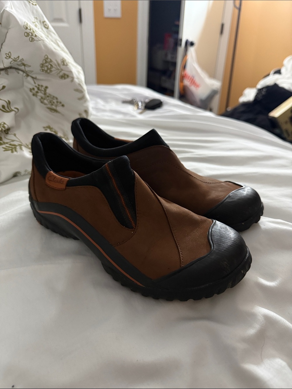 Clarks Slip-On in Brown and Black